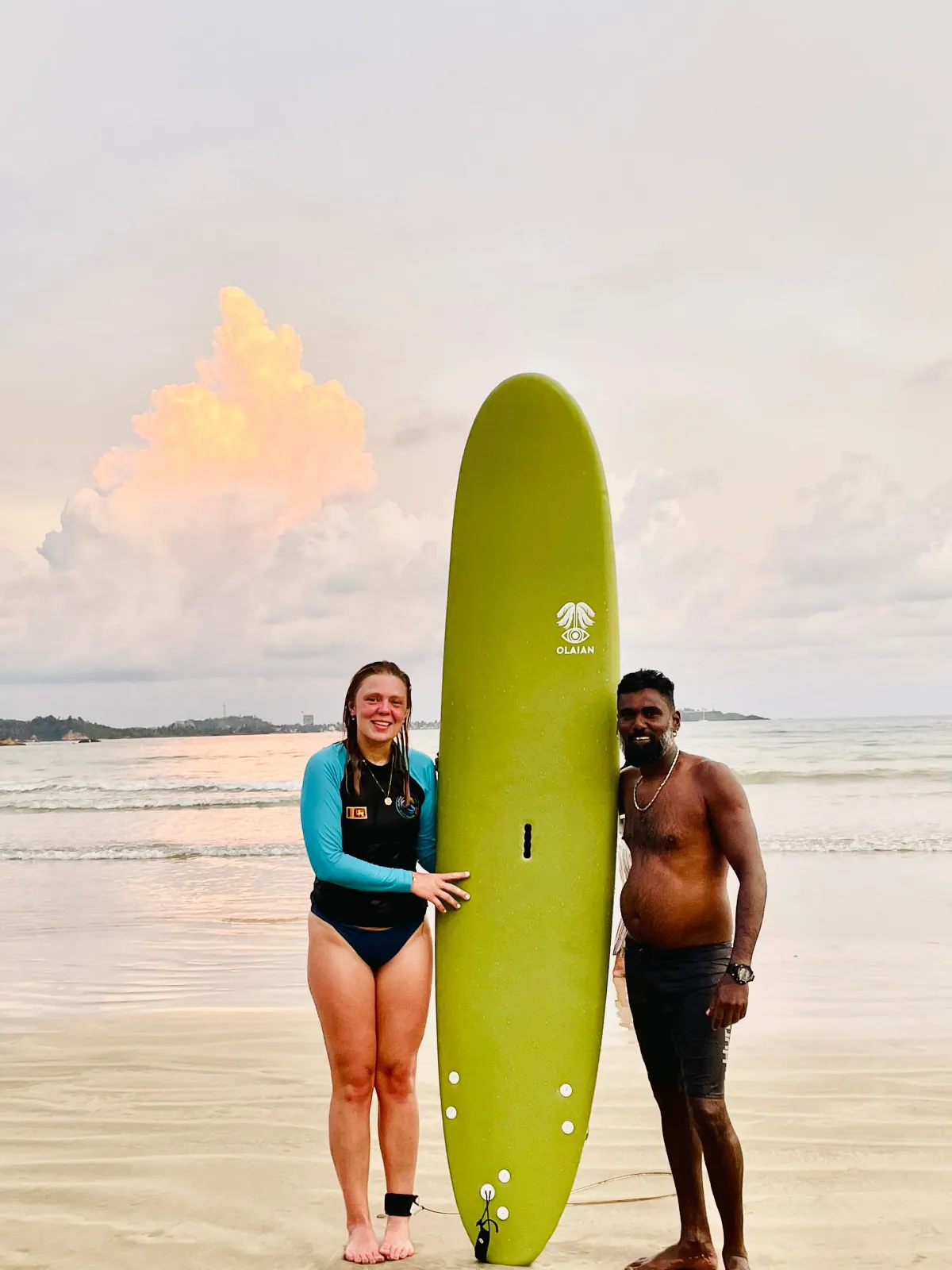 Surfboards against the Weligama sunset sky