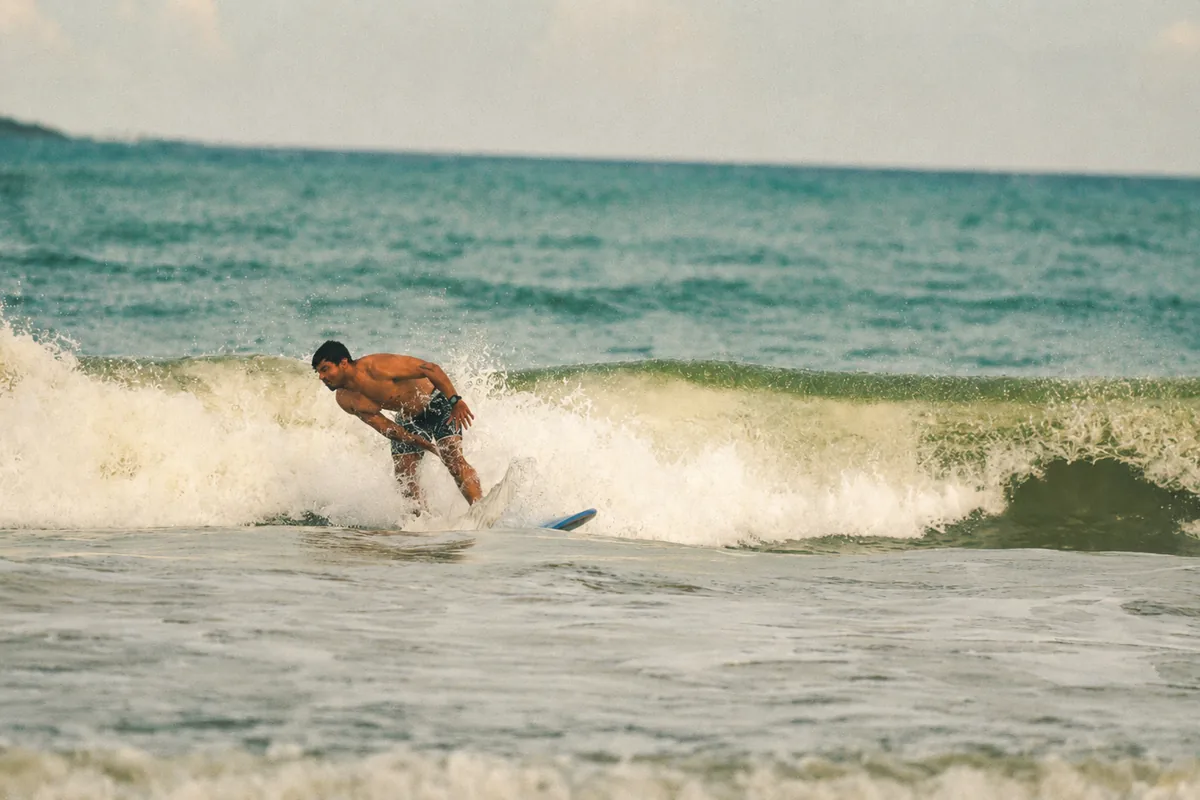 Sunrise surf session on Weligama Beach, Sri Lanka